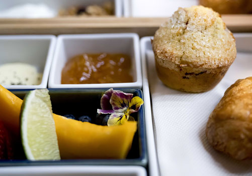 Breakfast at ESPACIO with fresh fruit and pastries.