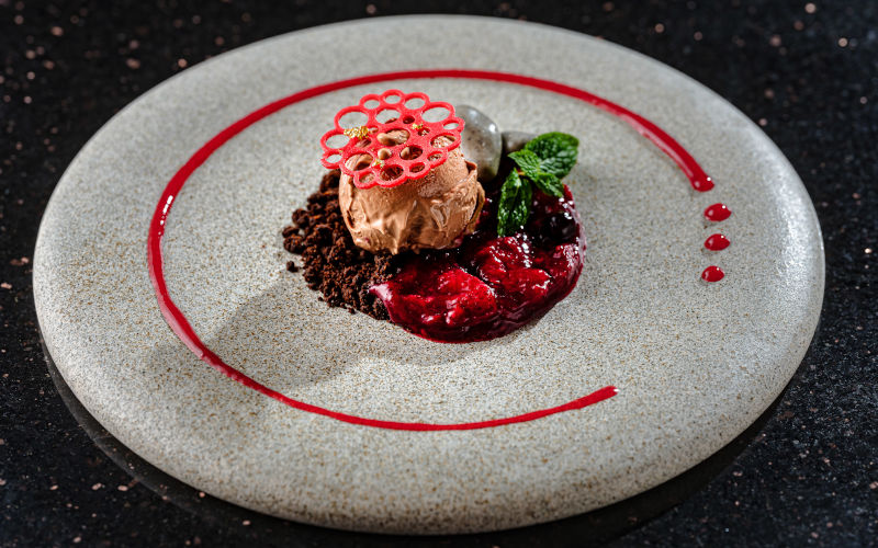 Kinako crumble, Chocolate Baileys Ice Cream, Berry compote, Black sesame cremeux, Raspberry sauce, Strawberry tuile